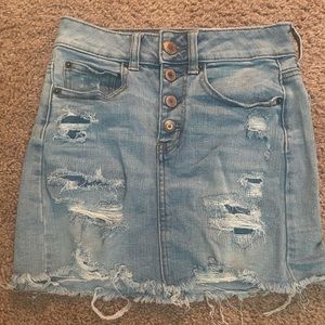 ripped blue jean skirt